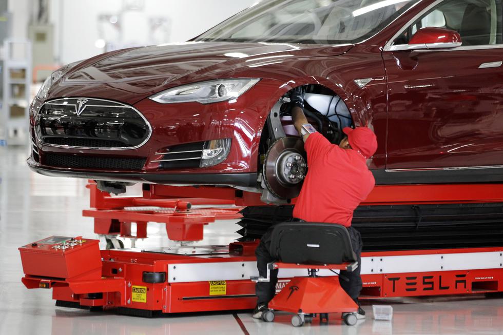 Charge Time: Electric Car Workers Accuse Tesla of Low Pay and
