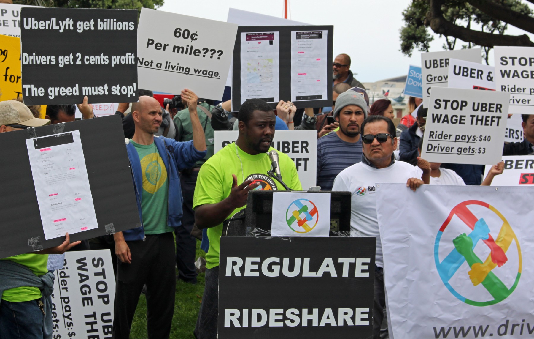 The Taking Economy: Rideshare Drivers Protest Low Pay - The American ...